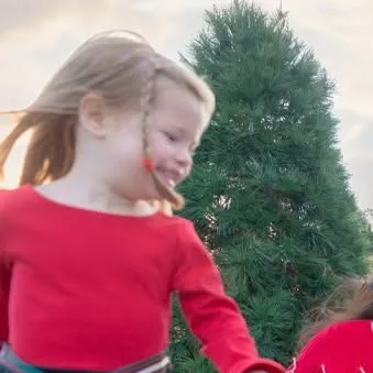 "Okay, Caroline...run around mom and dad! Tie them up in Christmas lights!!