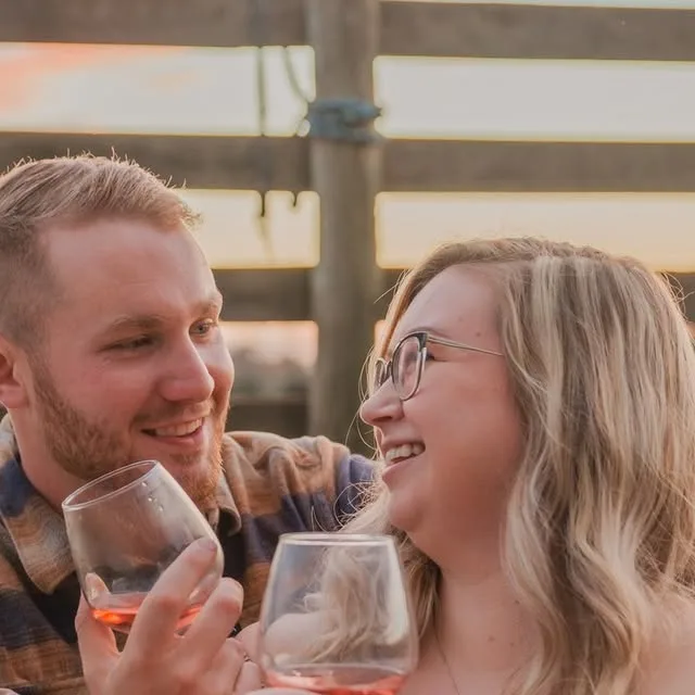 This candid moment is brought to you by "oops! I spilled champagne on your dress!